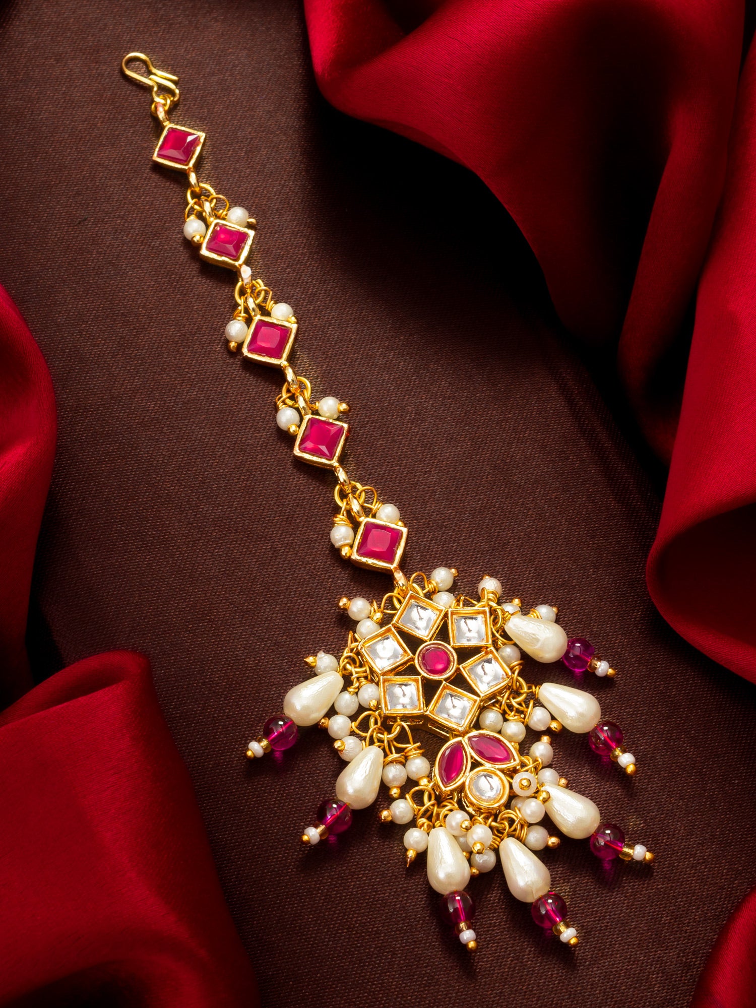Aadita Gold Plated Diamond-Cut Ruby Stone Chain Mangtika with Kundan Star Pendant and Pearl Drops