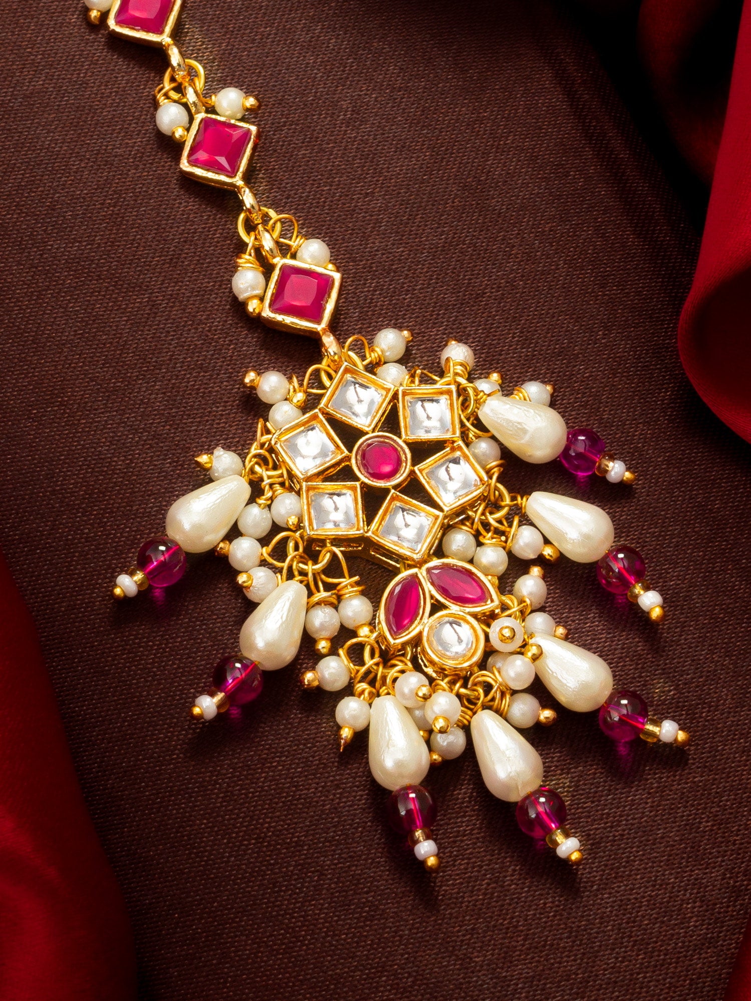 Aadita Gold Plated Diamond-Cut Ruby Stone Chain Mangtika with Kundan Star Pendant and Pearl Drops