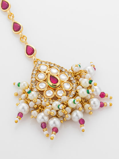 Aadita Gold Plated Ruby Teardrop Chain Mangtika with Kundan Triangle Pendant and Pearl Cluster Fringe