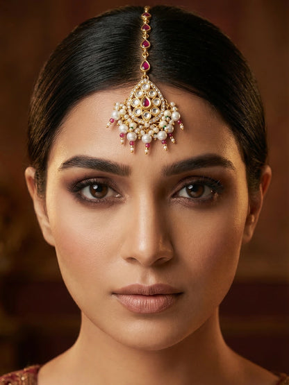 Aadita Gold Plated Ruby Teardrop Chain Mangtika with Kundan Triangle Pendant and Pearl Cluster Fringe