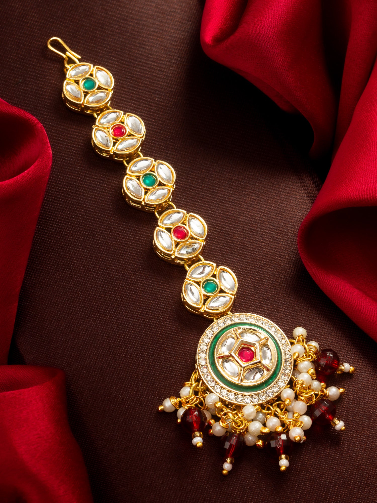 Aadita Gold Plated Linked Kundan Medallion Chain Mangtika with Circular Meenakari Pendant and Garnet Bead Fringe