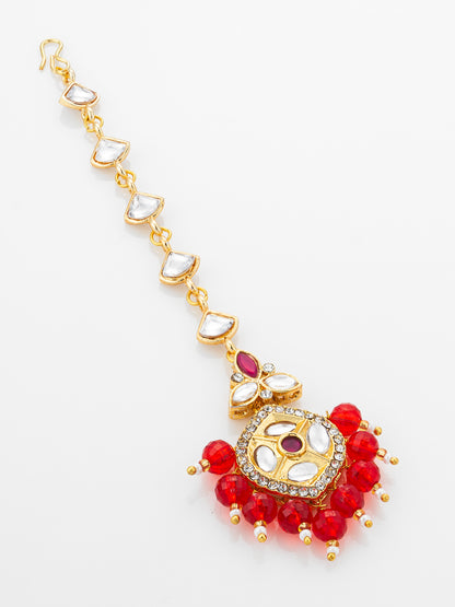 Aadita Gold Plated Half-Moon Kundan Chain Mangtika with Hexagonal Pendant and Red Bead Fringe