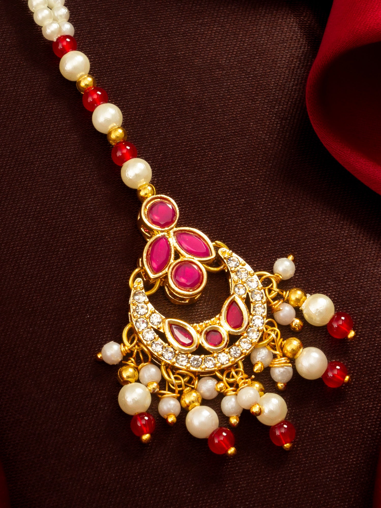Aadita Gold Plated Ruby Stone Flower Pendant Mangtika with Pearl and Red Bead Chain