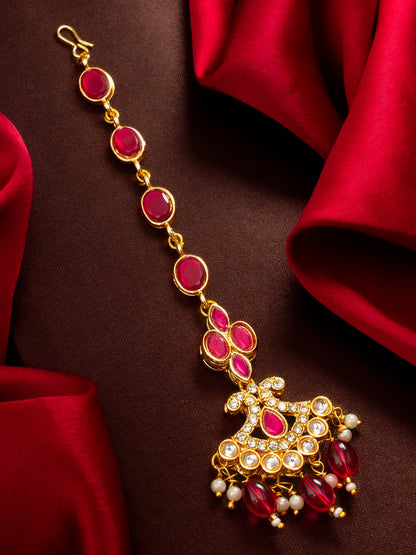 Aadita Gold Plated Ruby Oval Chain Mangtika with Cross Kundan Pendant and Pink Bead Drops