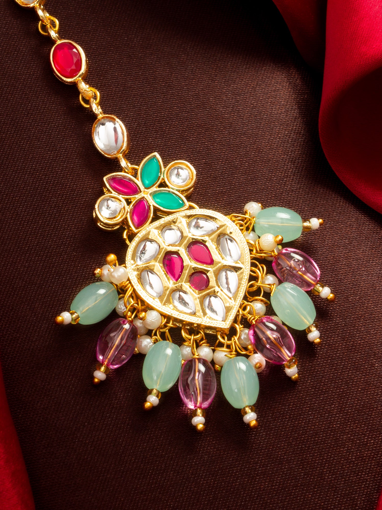 Aadita Gold Plated Mixed Oval Stone Chain Mangtika with Kundan Heart Pendant and Pastel Bead Fringe