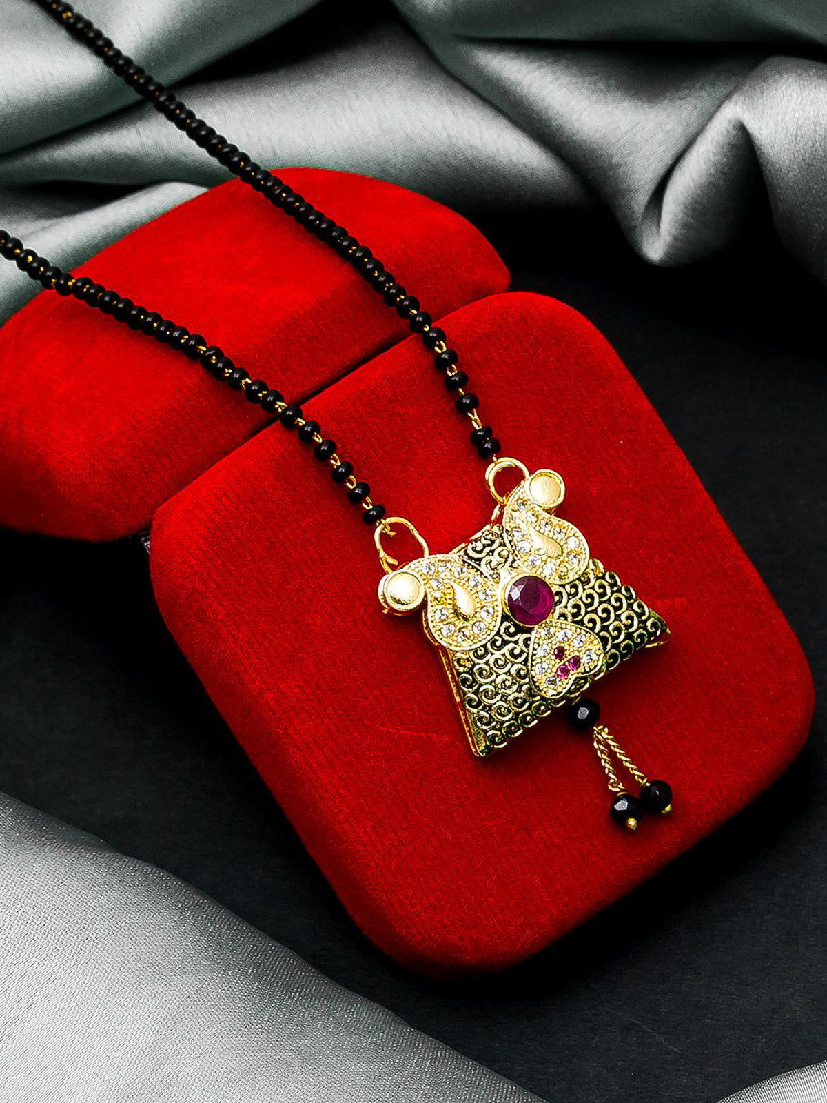 Aadita Festive Gold-Toned Oxidized Black Bead Mangalsutra with AD Centre Pendant