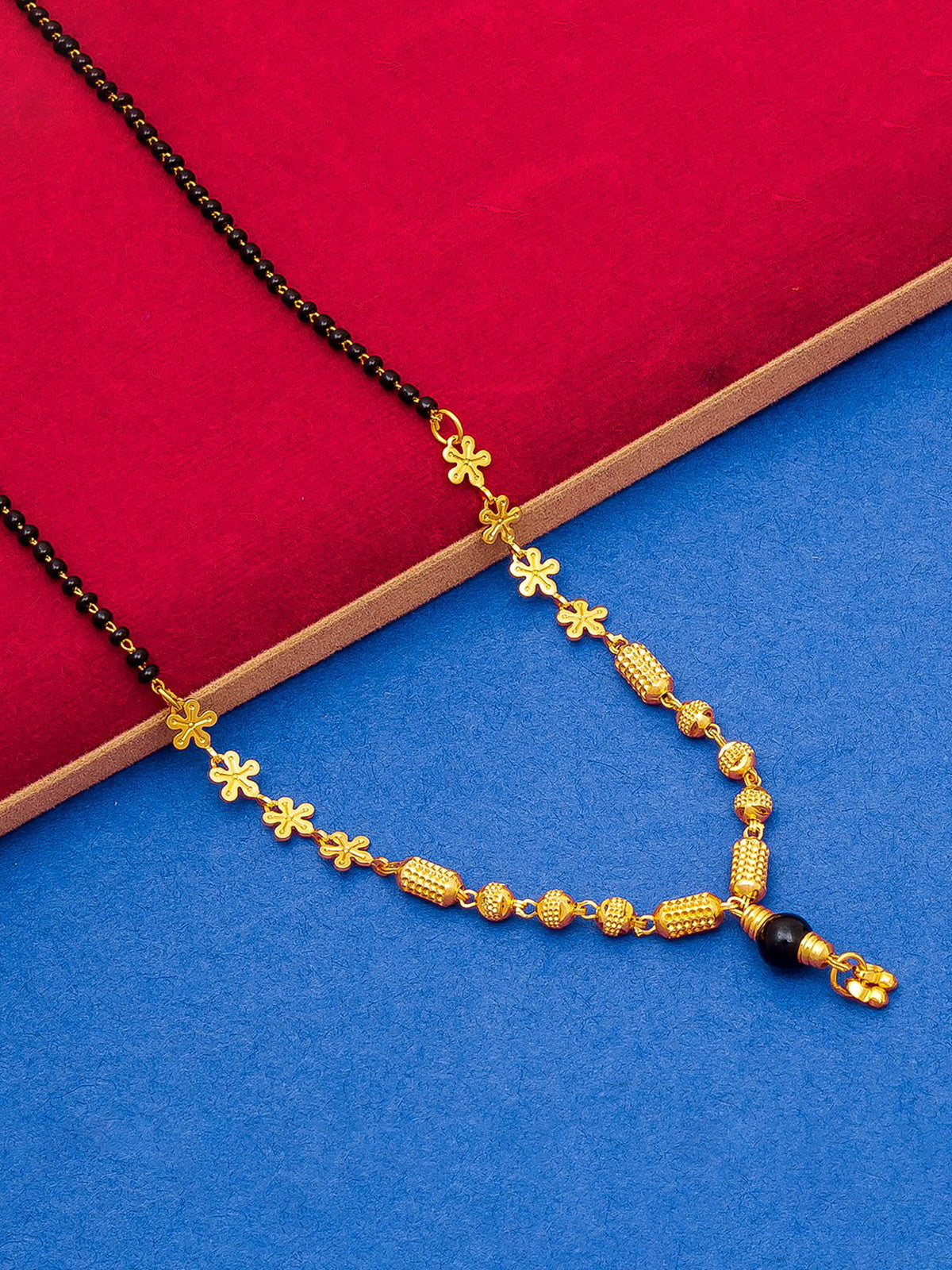 Aadita Gold-Toned Traditional Mangalsutra with Black Beads, Floral and Textured Barrel Pendants for Daily Wear