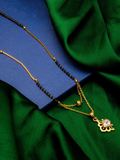 Aadita Gold-Toned Square Solitaire Mangalsutra with Filigree Scroll Pendant and Black Beads Dual Chain For Festive Wear