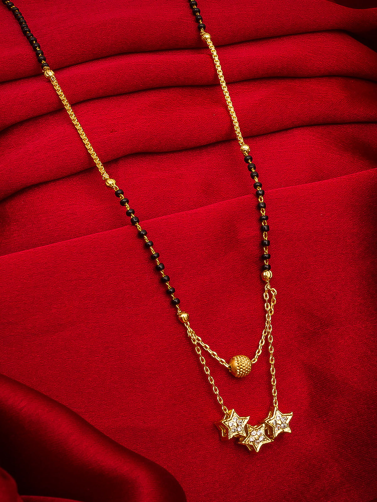 Aadita Daily Wear Gold-Toned Triple Star Pendant Mangalsutra with Black Beads and Dual Chain