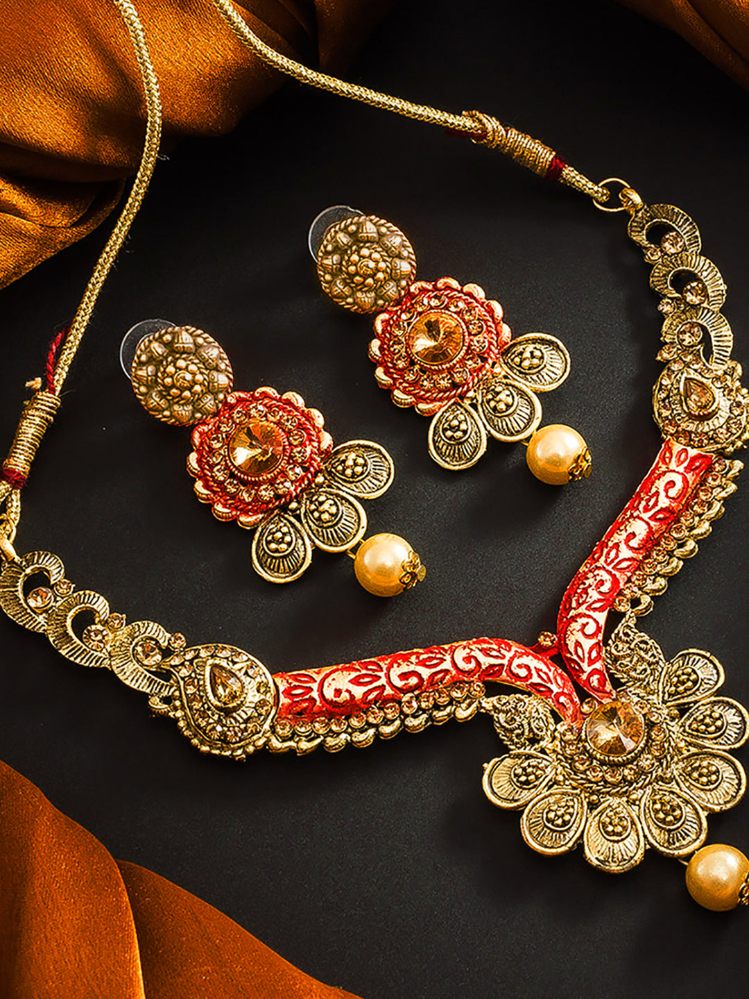 Aadita Antique Gold Floral Necklace Set with Orange Meenakari Accents, Pearl Drop and Matching Earrings
