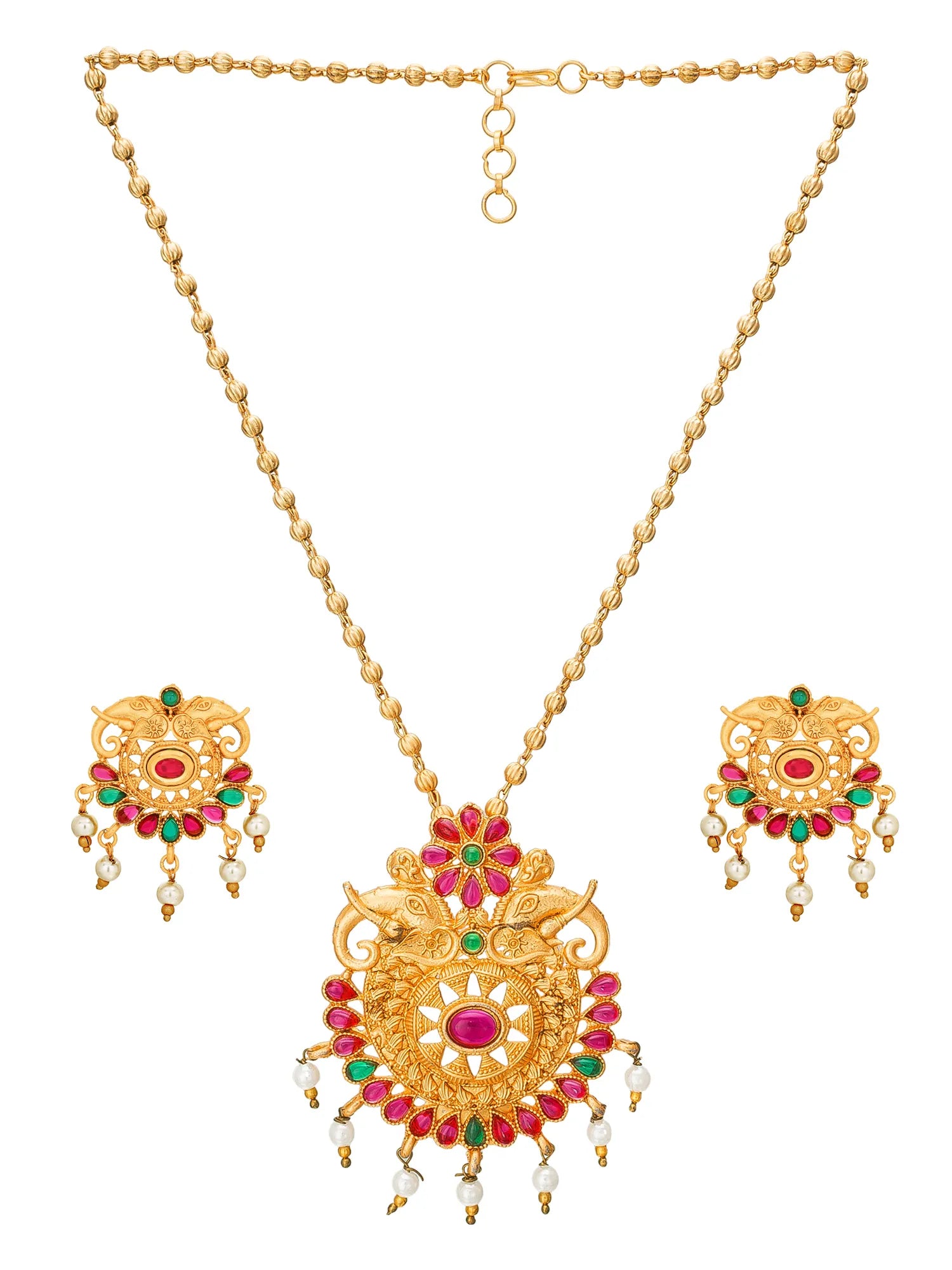 Gold-toned traditional Indian jewelry set featuring a necklace with an ornate pendant, matching earrings, and small dangling pearl-like accents on a plain white background.