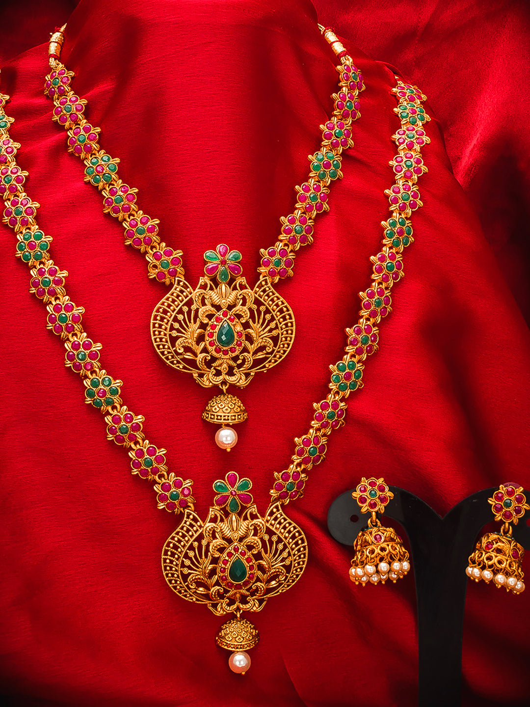 Aadita Antique Gold Floral Temple Haram Dual Necklace Set with Peacock Pendant, Stones and Jhumka Earrings