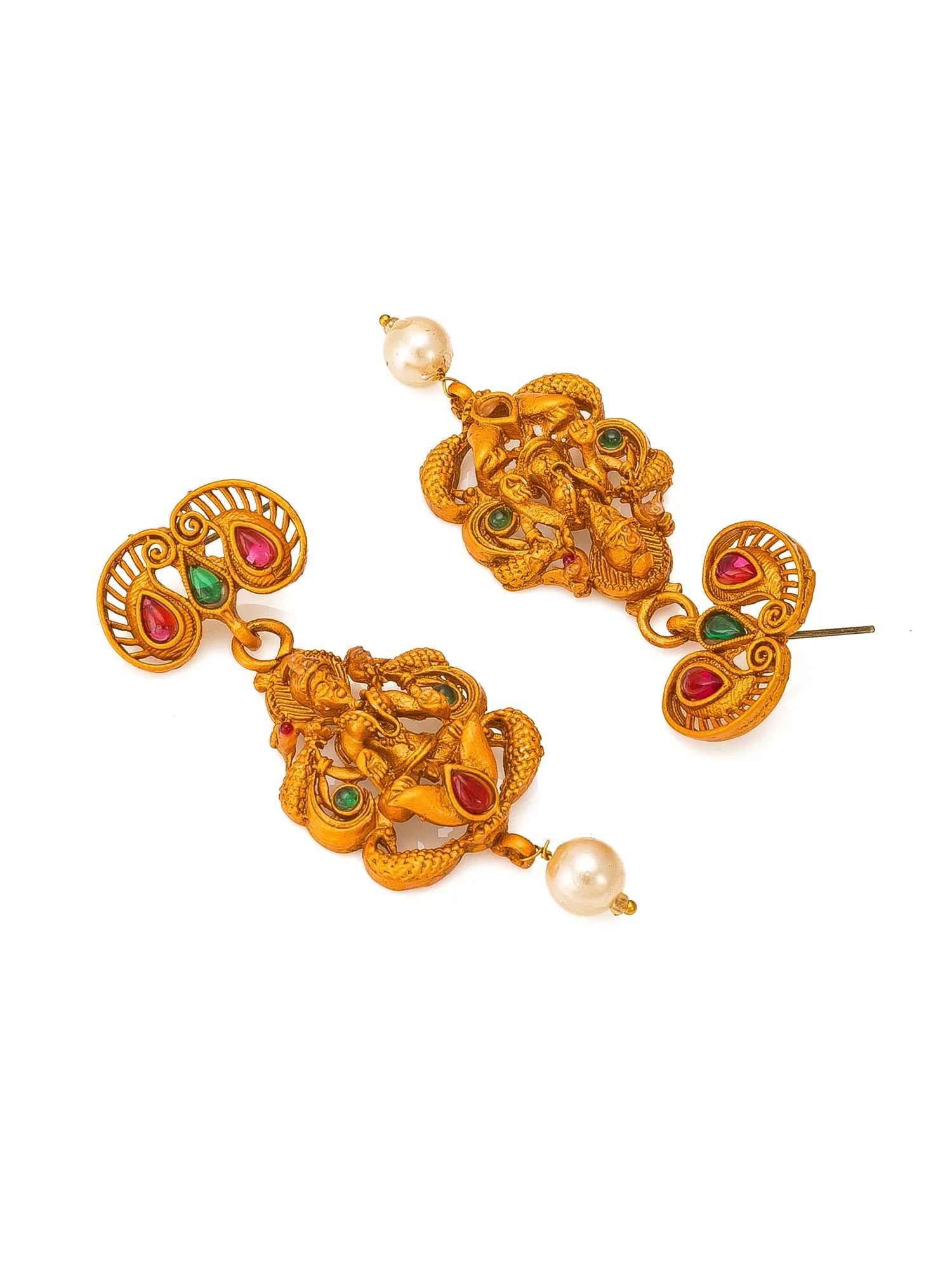A pair of ornate gold-toned traditional Indian earrings featuring Ganesha motifs, decorated with small red and green stones and accented by white pearl beads, shown on a plain white background.