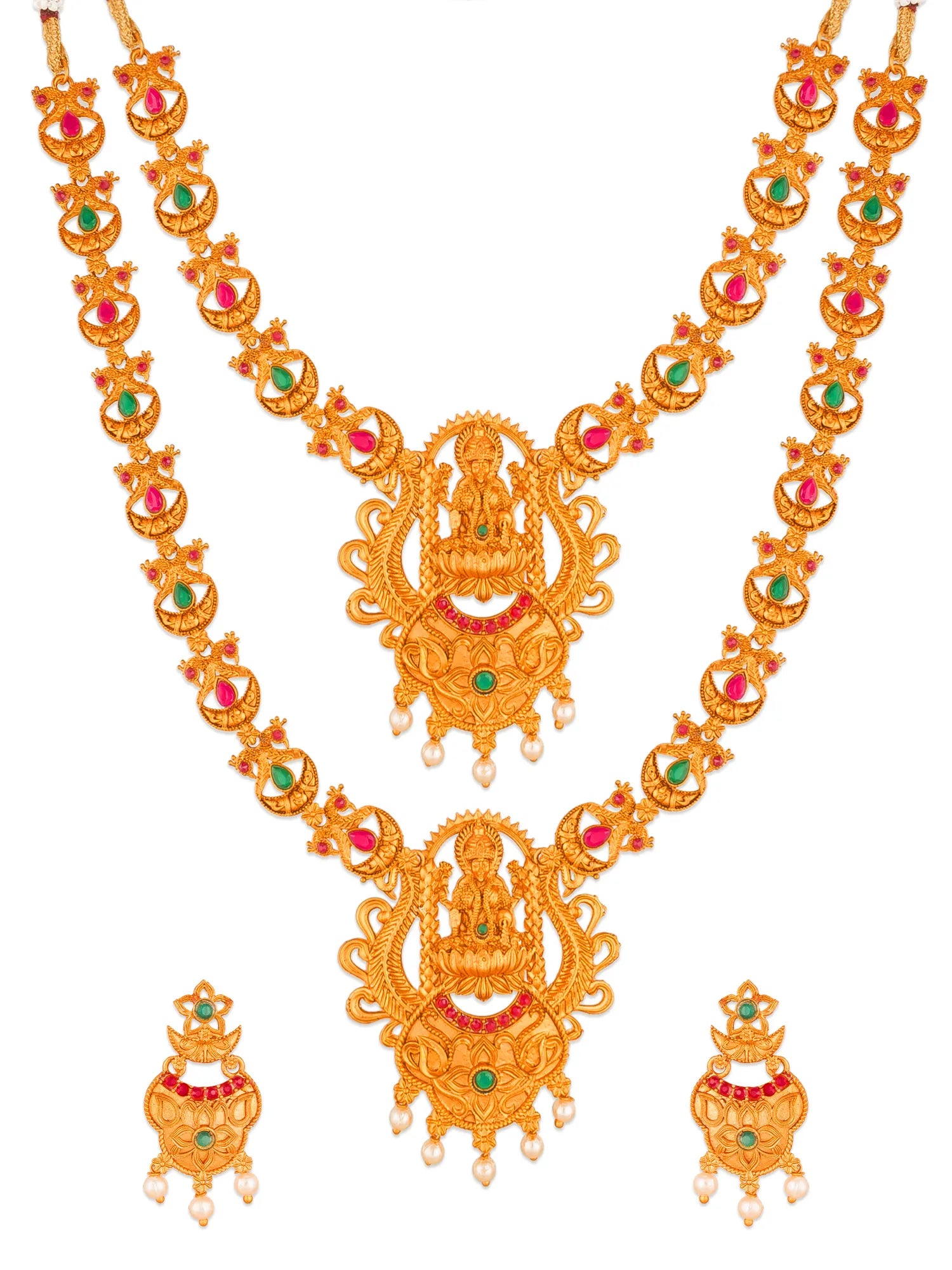 Gold-toned traditional Indian jewelry set featuring a double-strand necklace and matching earrings, decorated with red and green stone accents and small pearl-like dangling beads, shown on a plain white background.