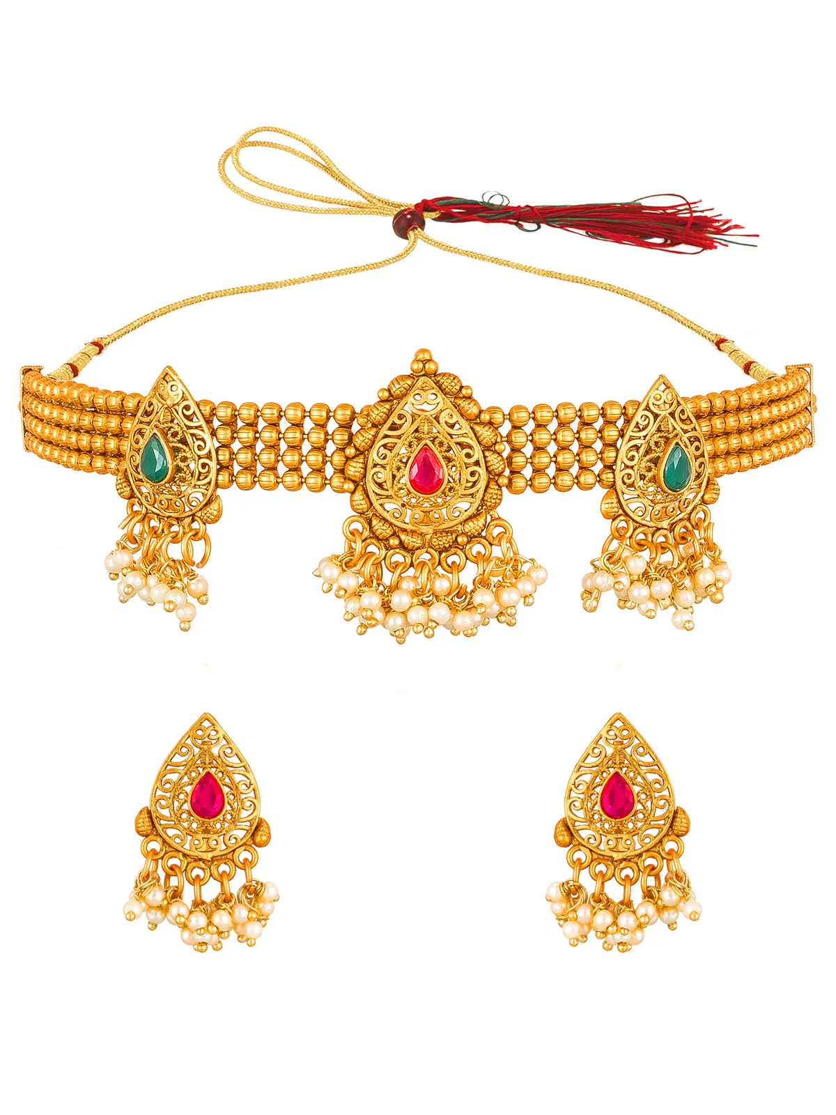 Gold-toned traditional jewelry set featuring a choker necklace with a red center stone and green side stones, matching drop earrings, and a red tassel, displayed on a white background.