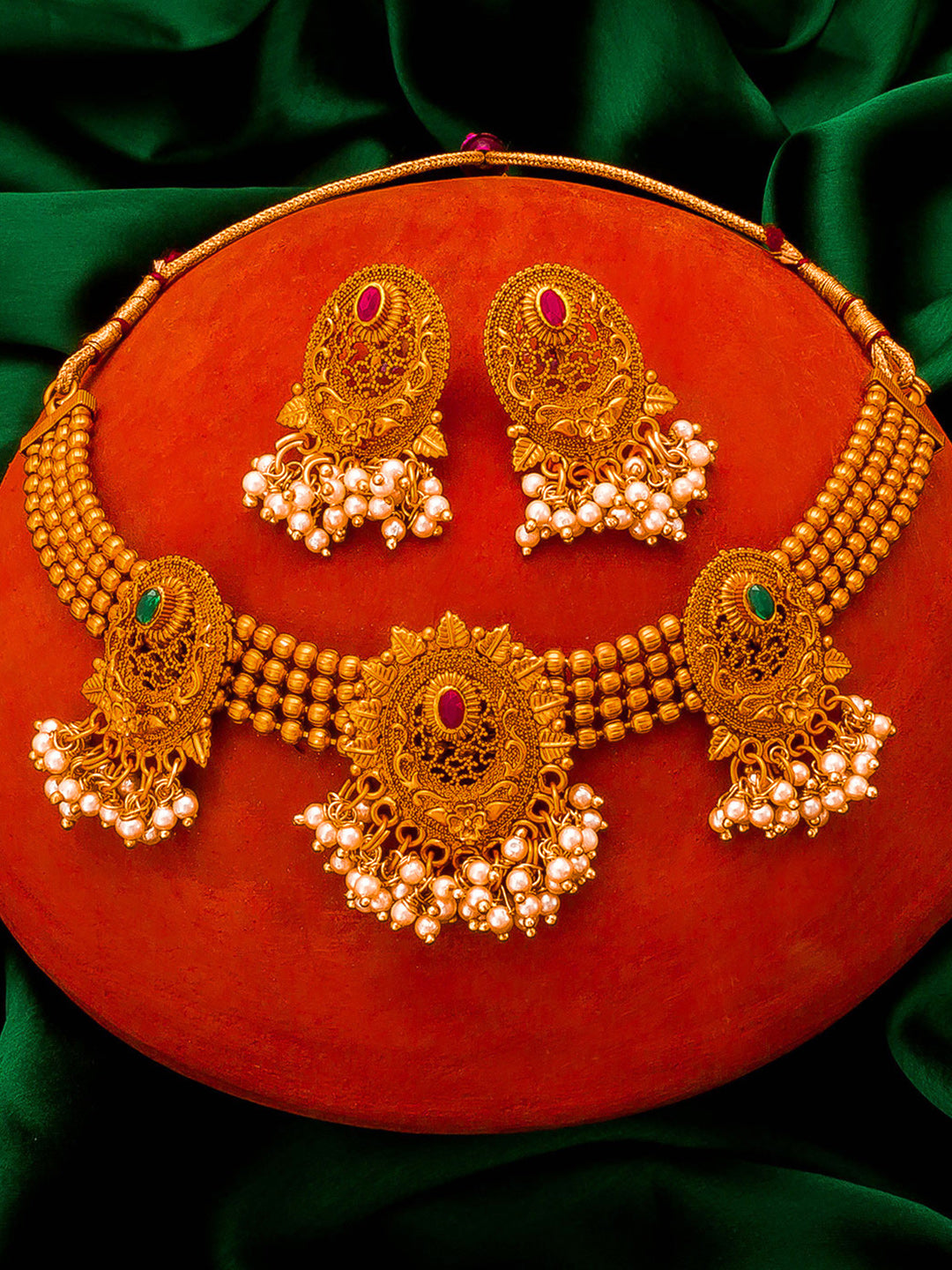 Aadita Gold-Tone Choker Necklace Set with Pearl Drops, Emerald Stones and Chandelier Earrings