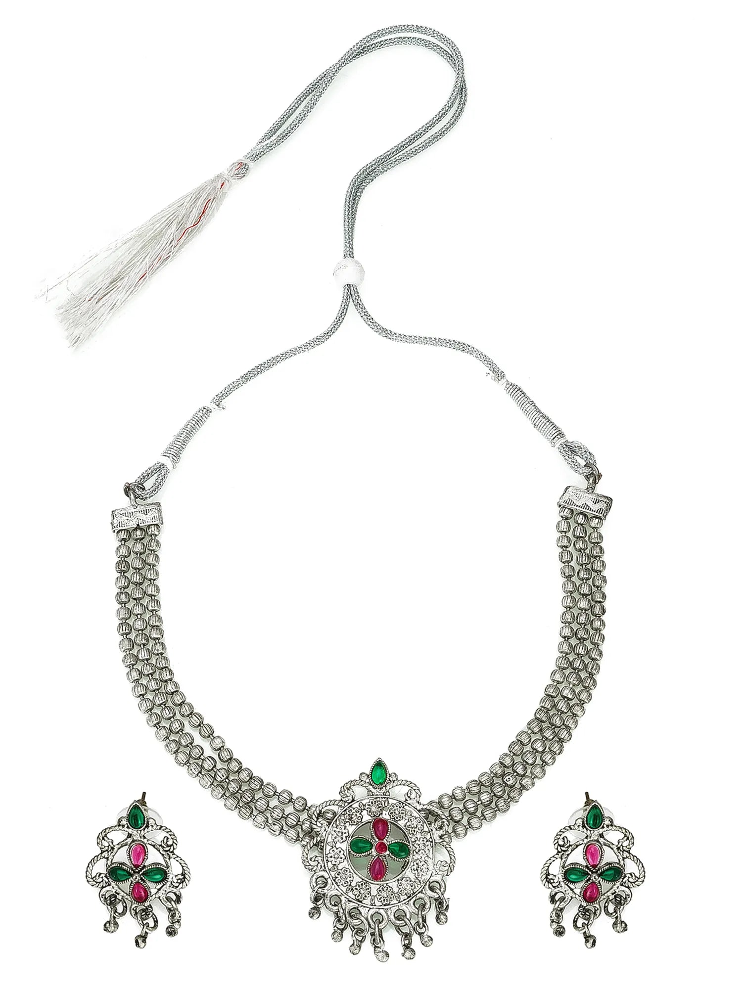 Silver necklace with matching earrings on a white background