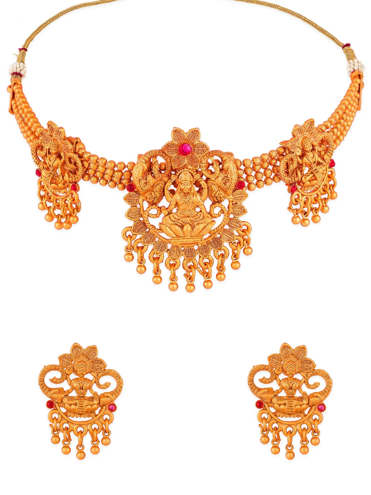 Gold-toned traditional necklace and matching earrings set with red gemstone accents, shown on a plain white background.