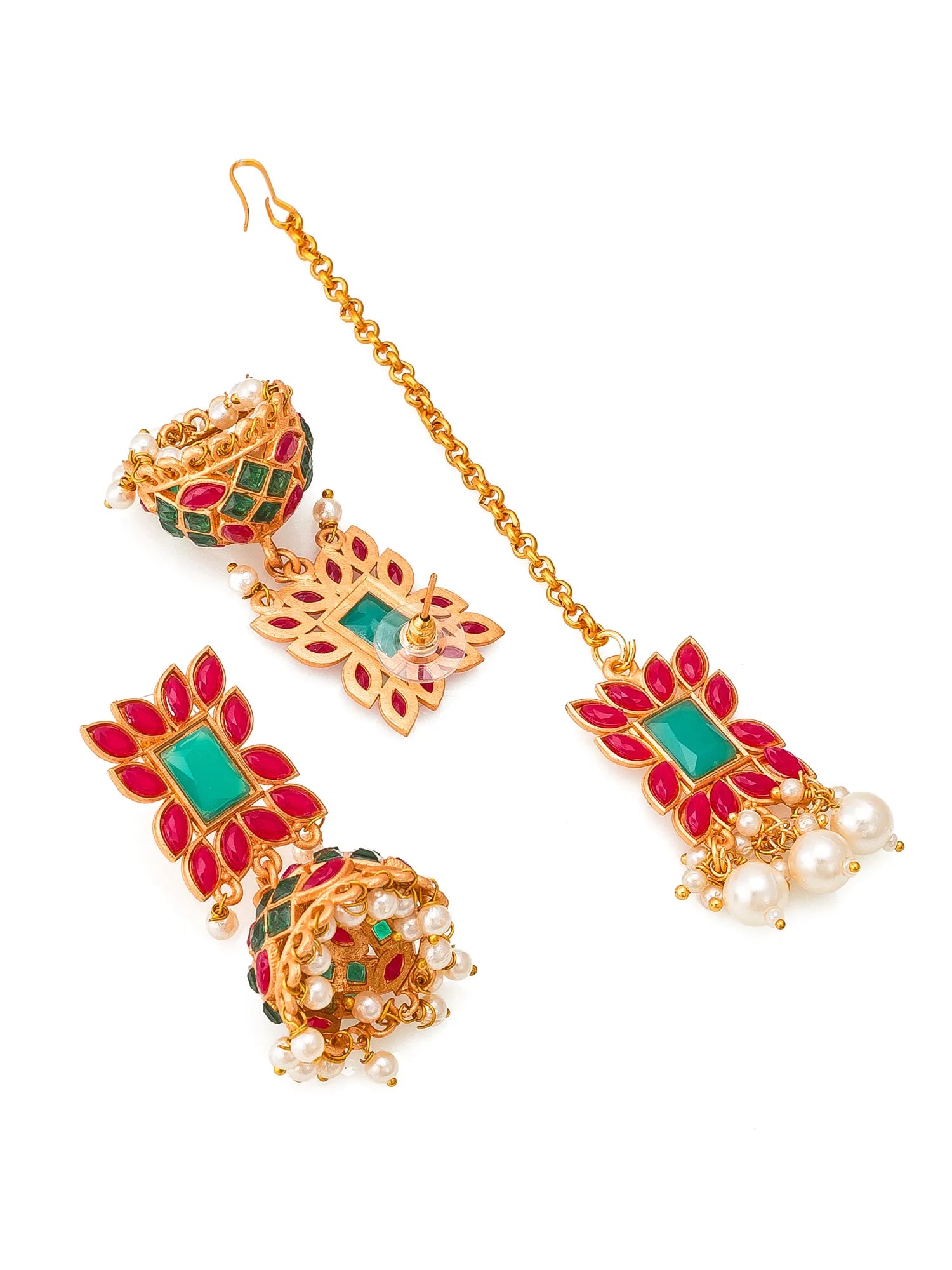 Gold-plated Indian jhumka earrings with red and green enamel, green stone centers, and dangling pearl accents, shown on a plain white background.