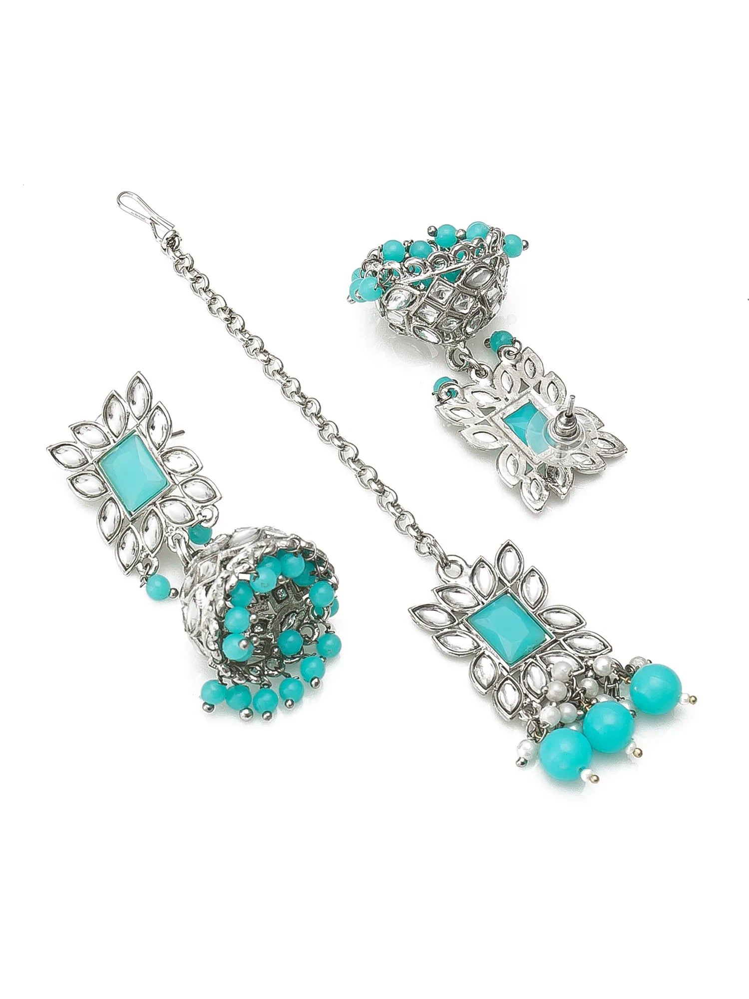 A silver-toned traditional Indian jewelry set featuring a matching forehead chain (mala) and earrings with turquoise blue stones and beads, displayed on a clean white background.