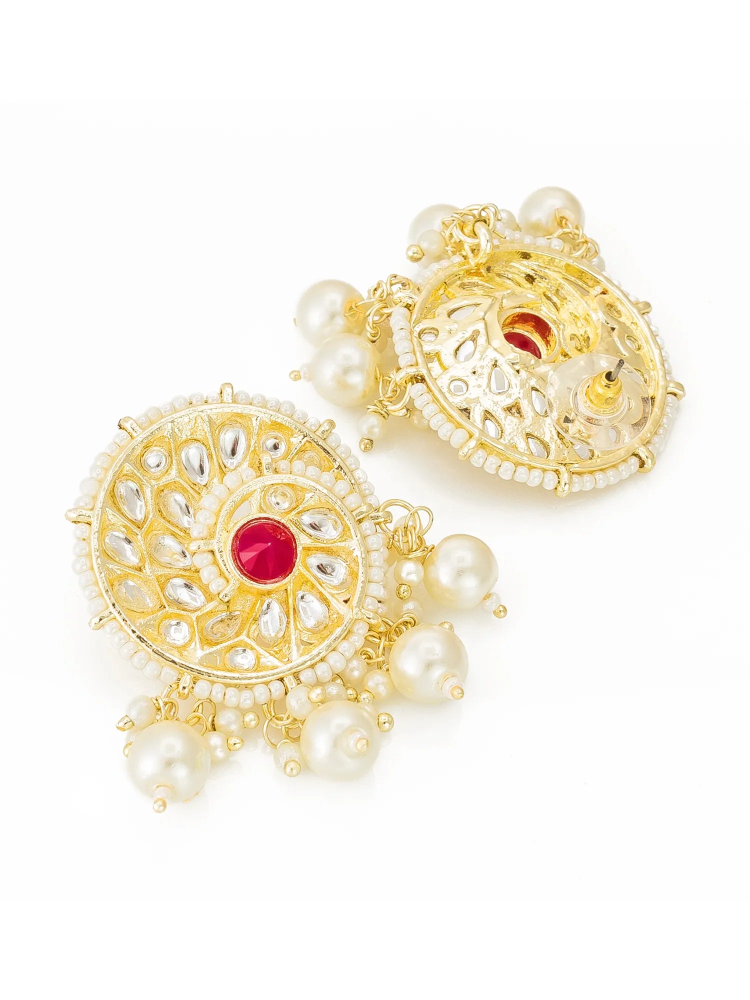 A pair of ornate gold-toned earrings decorated with white faux pearls, clear stones, and a central red gemstone, shown on a plain white background.