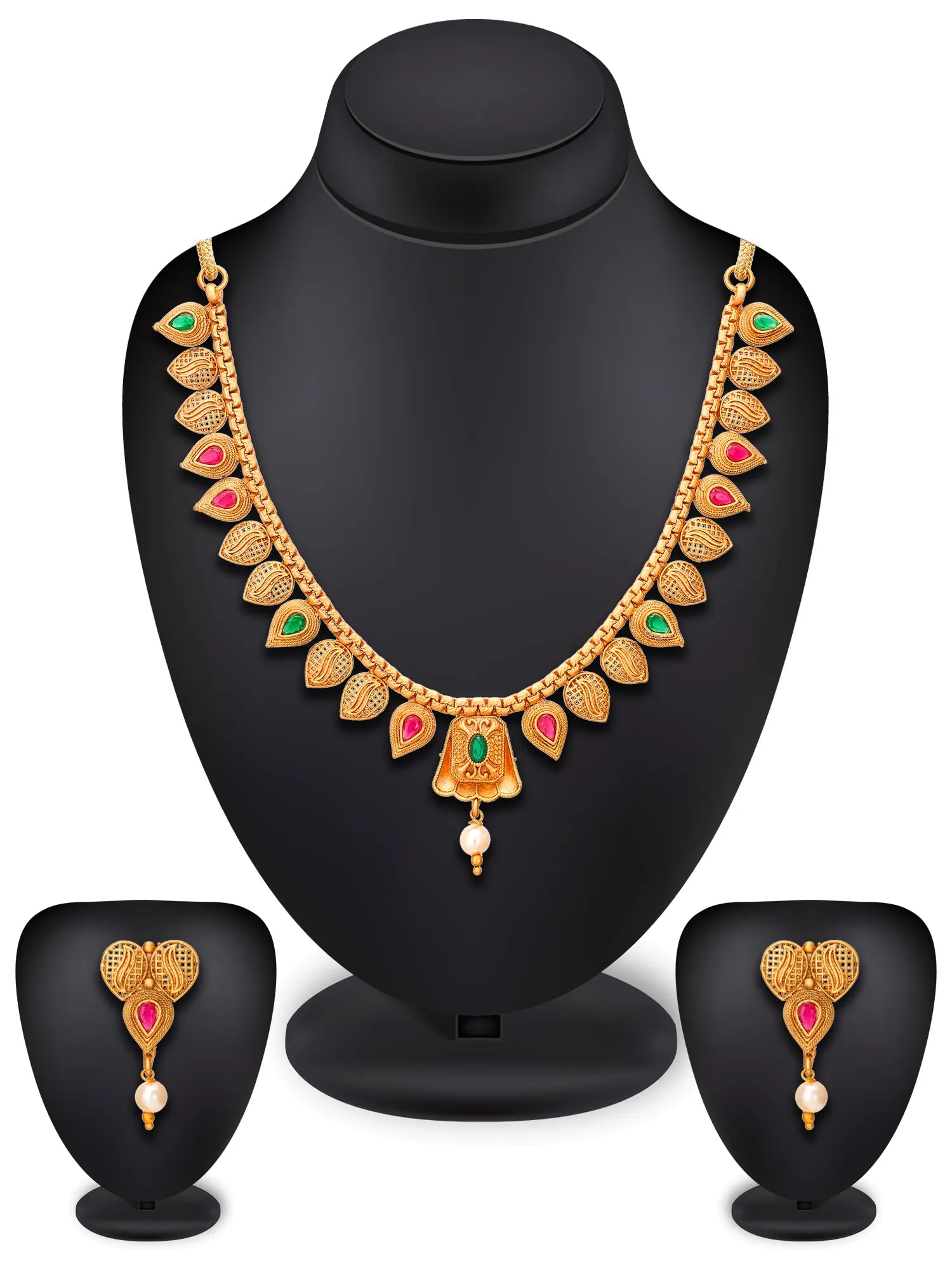 Gold-toned traditional Indian jewelry set displayed on a black mannequin bust, including a necklace, earrings, and a stacker, decorated with red, green, and white stone accents.