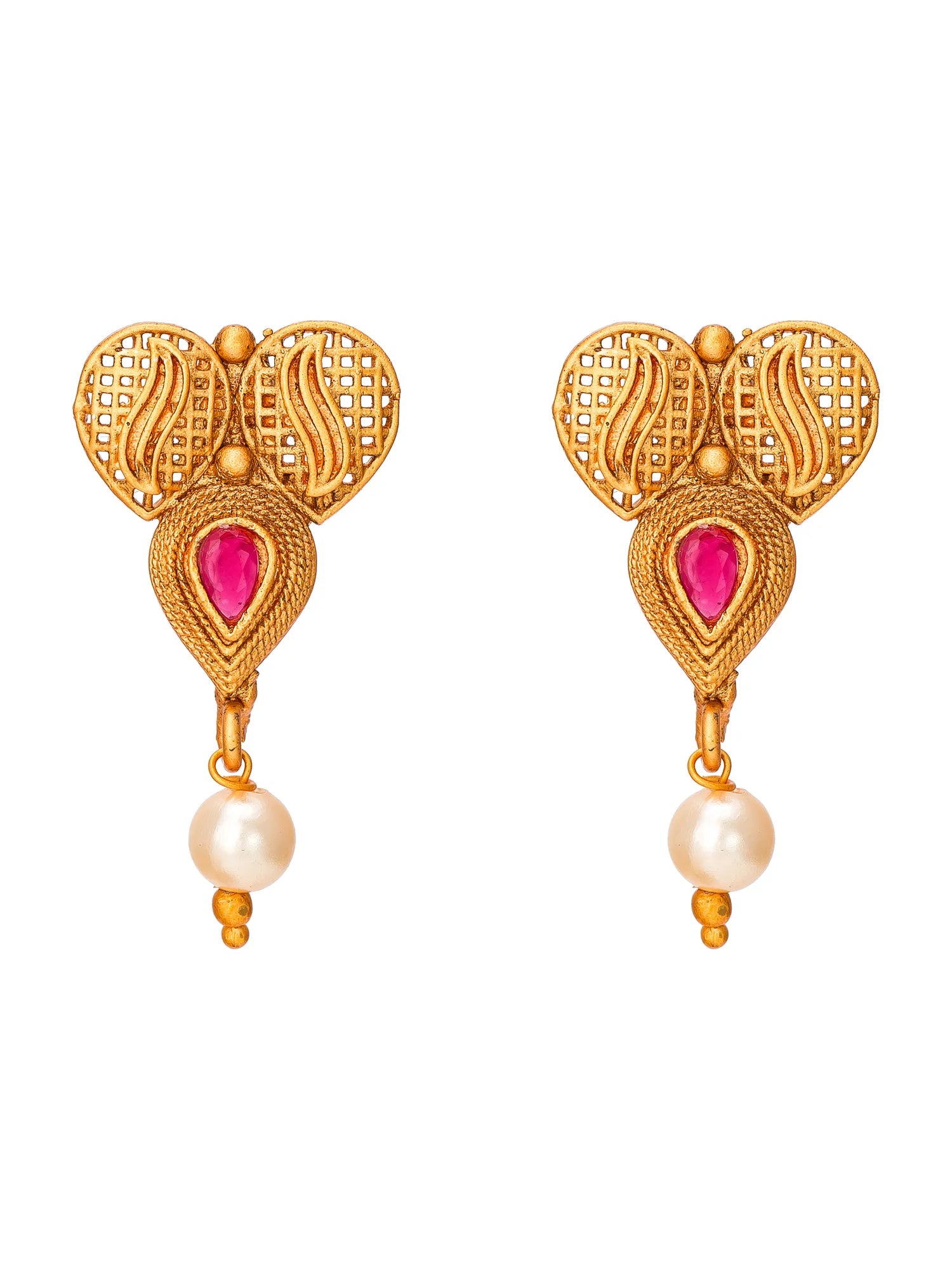 A pair of gold-toned traditional Indian dangle earrings featuring a teardrop-shaped pink gemstone, a white pearl drop, and intricate filigree heart-shaped designs on a solid white background.