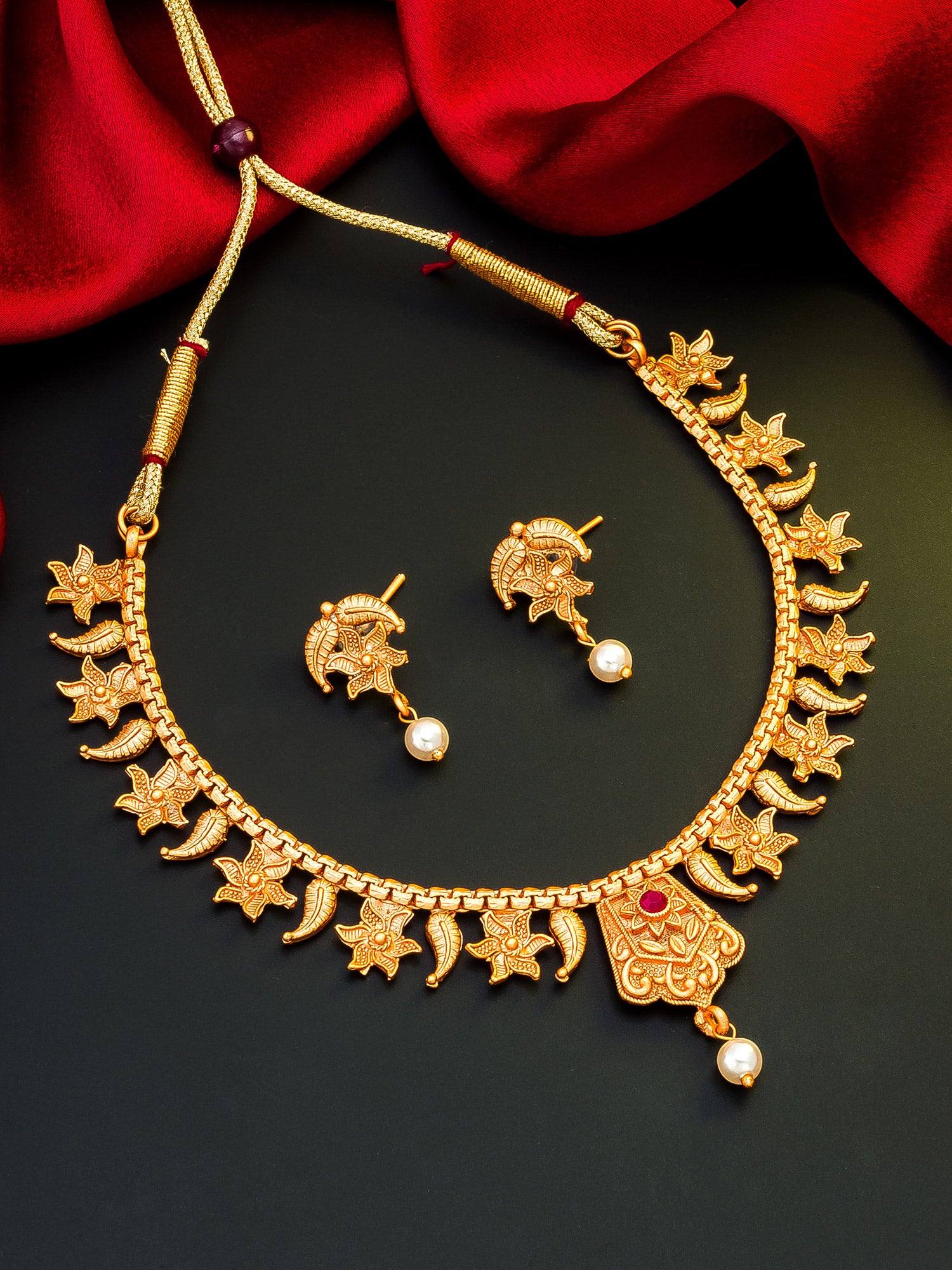 Aadita Gold-Toned Floral Leaf Chain Necklace Set with Pearl Drop and Matching Earrings
