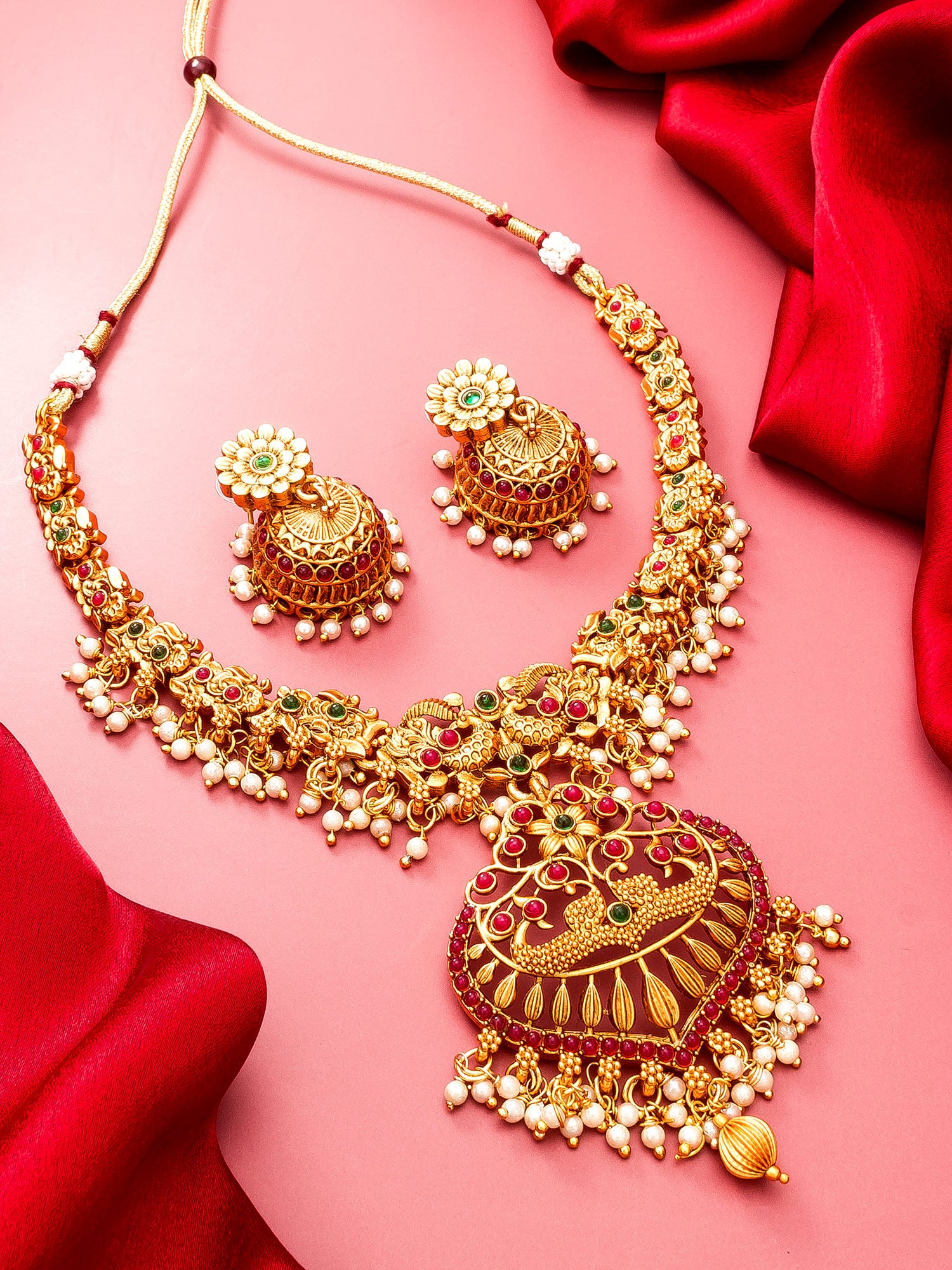 Aadita Gold-Tone Peacock Necklace Set with Emerald Stones and Jhumka Earrings