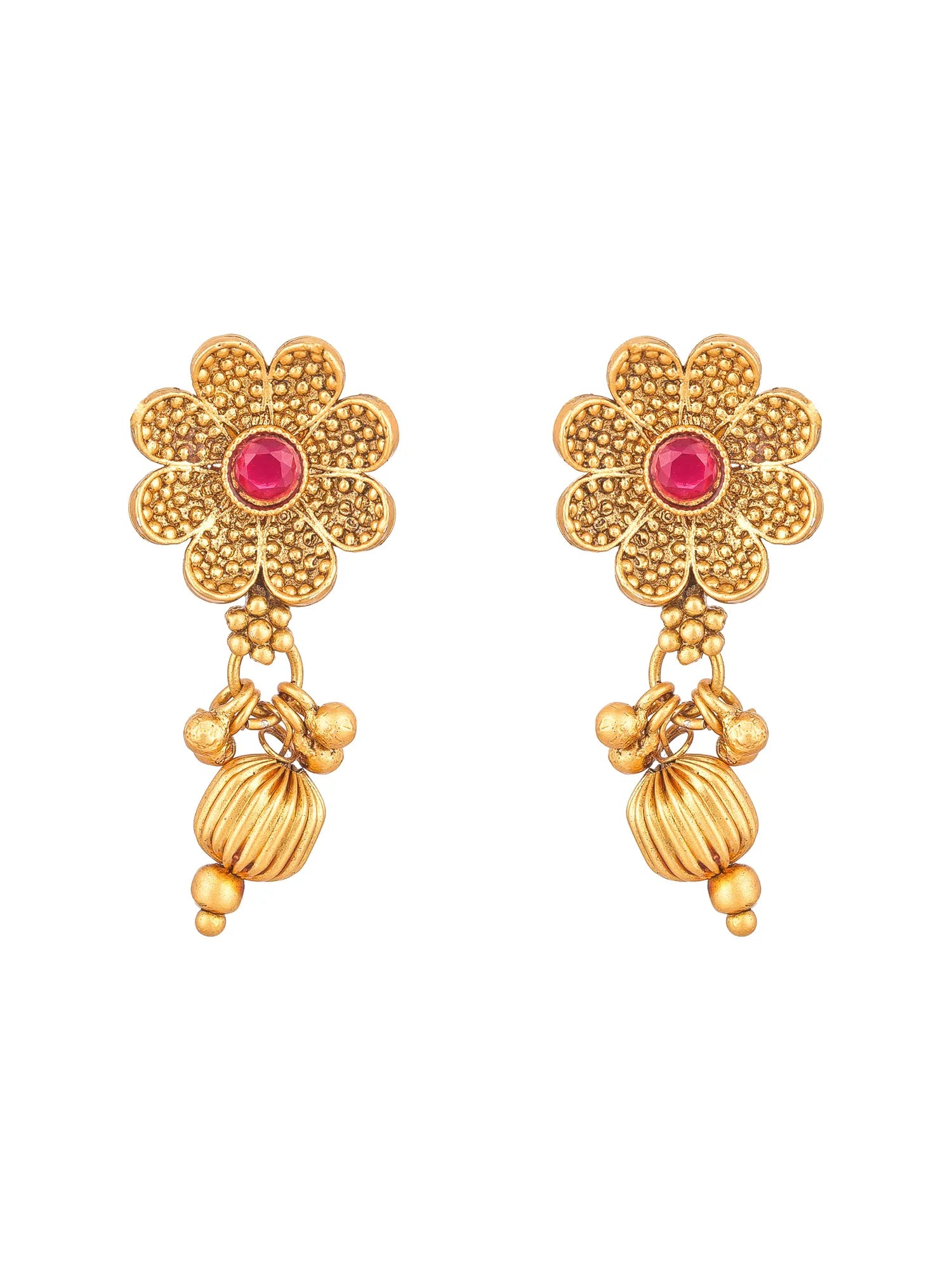 A pair of gold-toned floral dangle earrings with a small round pink gemstone in the center of each flower and hanging textured bead drops, shown on a plain white background.