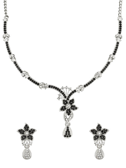 Jewelry set with necklace and earrings featuring black and silver design on a white background