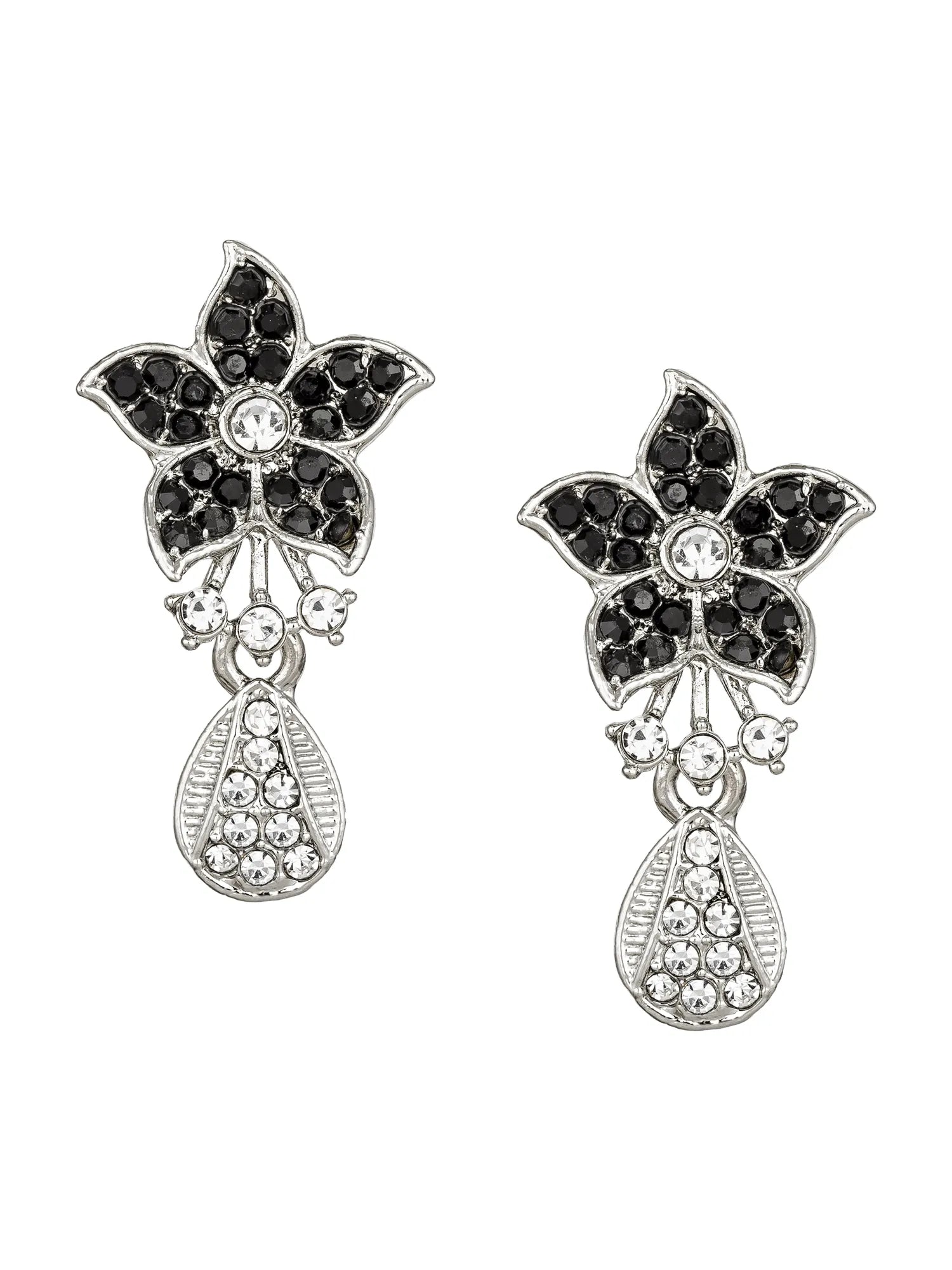 Pair of floral earrings with black gemstones and silver accents on a white background