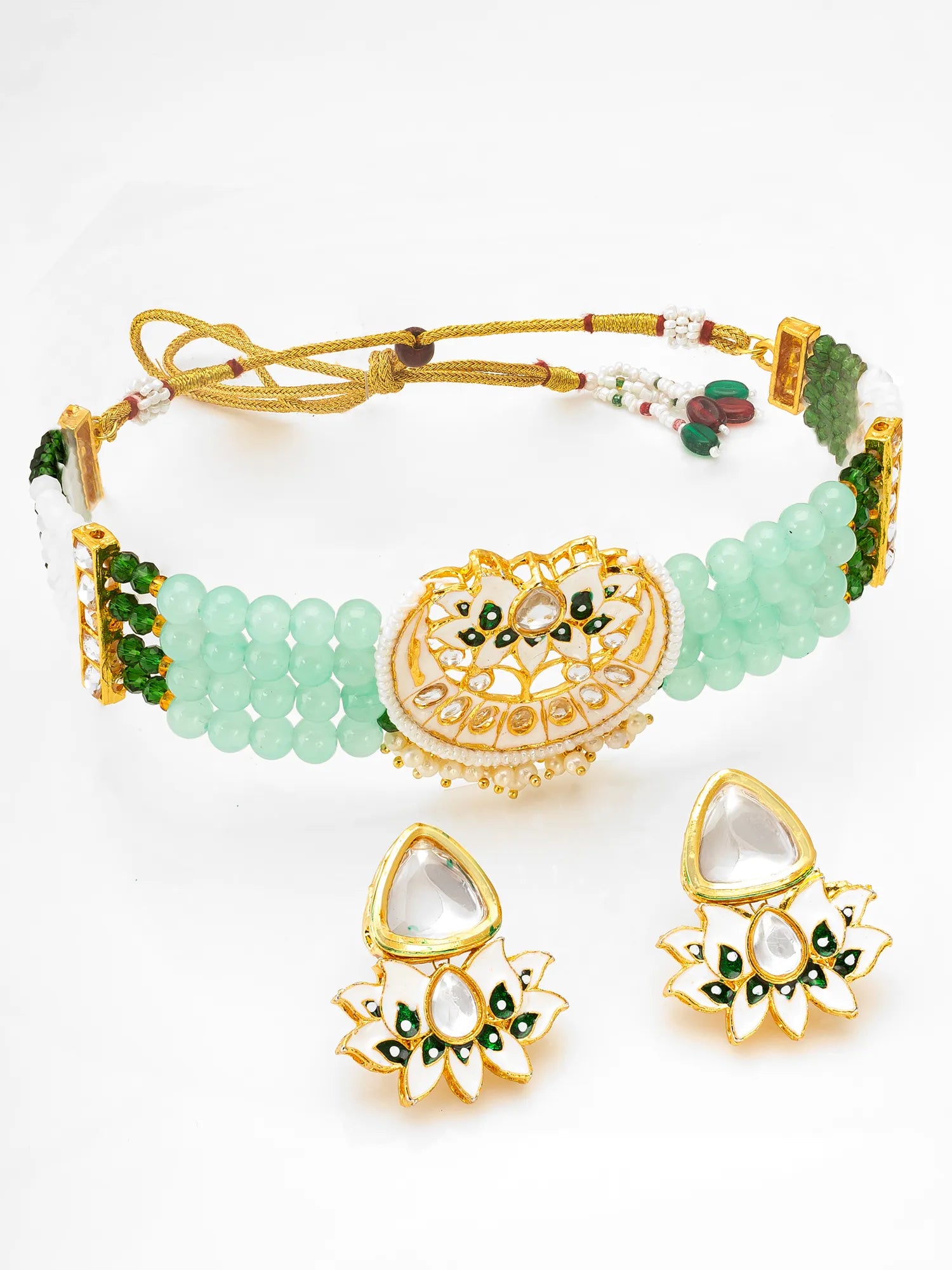 Jewelry set with necklace, earrings, and ring on a white background