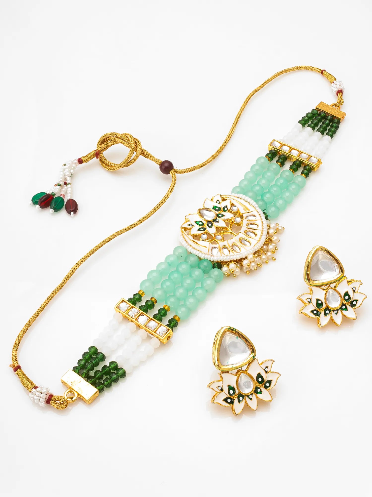 Jewelry set with necklace and earrings on a white background