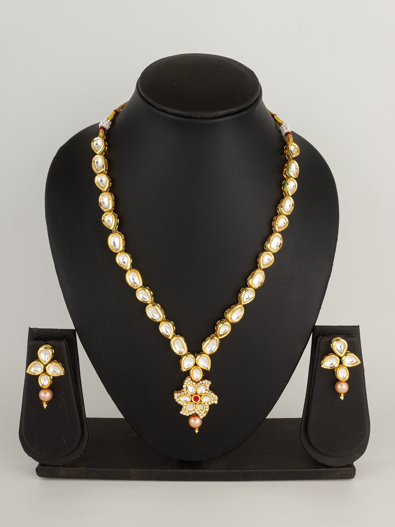 Classic Gold-Plated Kundan Teardrop Necklace with Floral Star Pendant