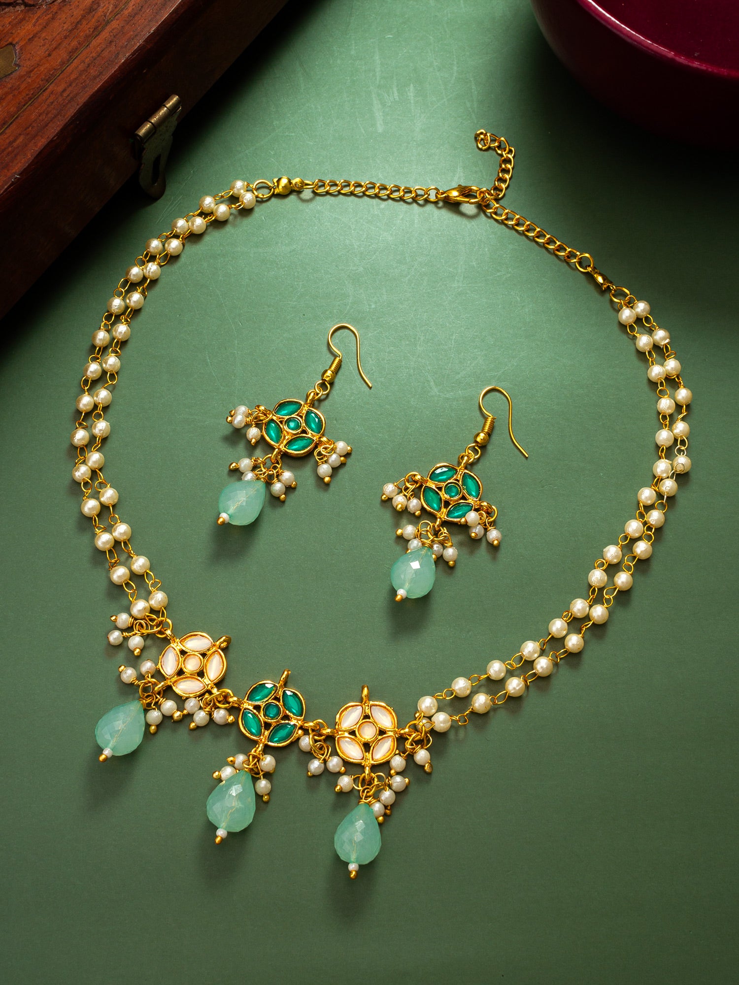 Traditional Double-Strand Pearl Necklace Set with Emerald Green Kundan Motifs and Mint Green Drops