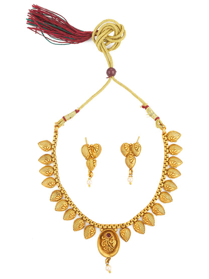 Gold necklace set with tassel on a white background
