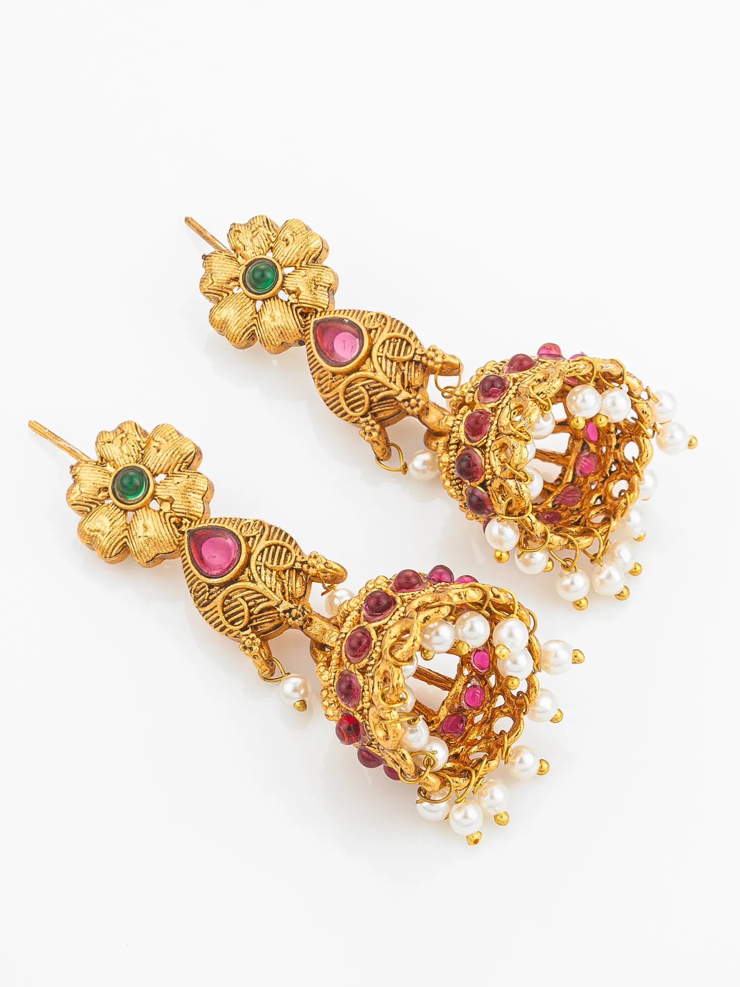Gold earrings with gemstones on a white background