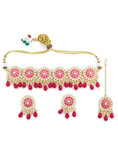 Jewelry set with pink and gold elements on a white background