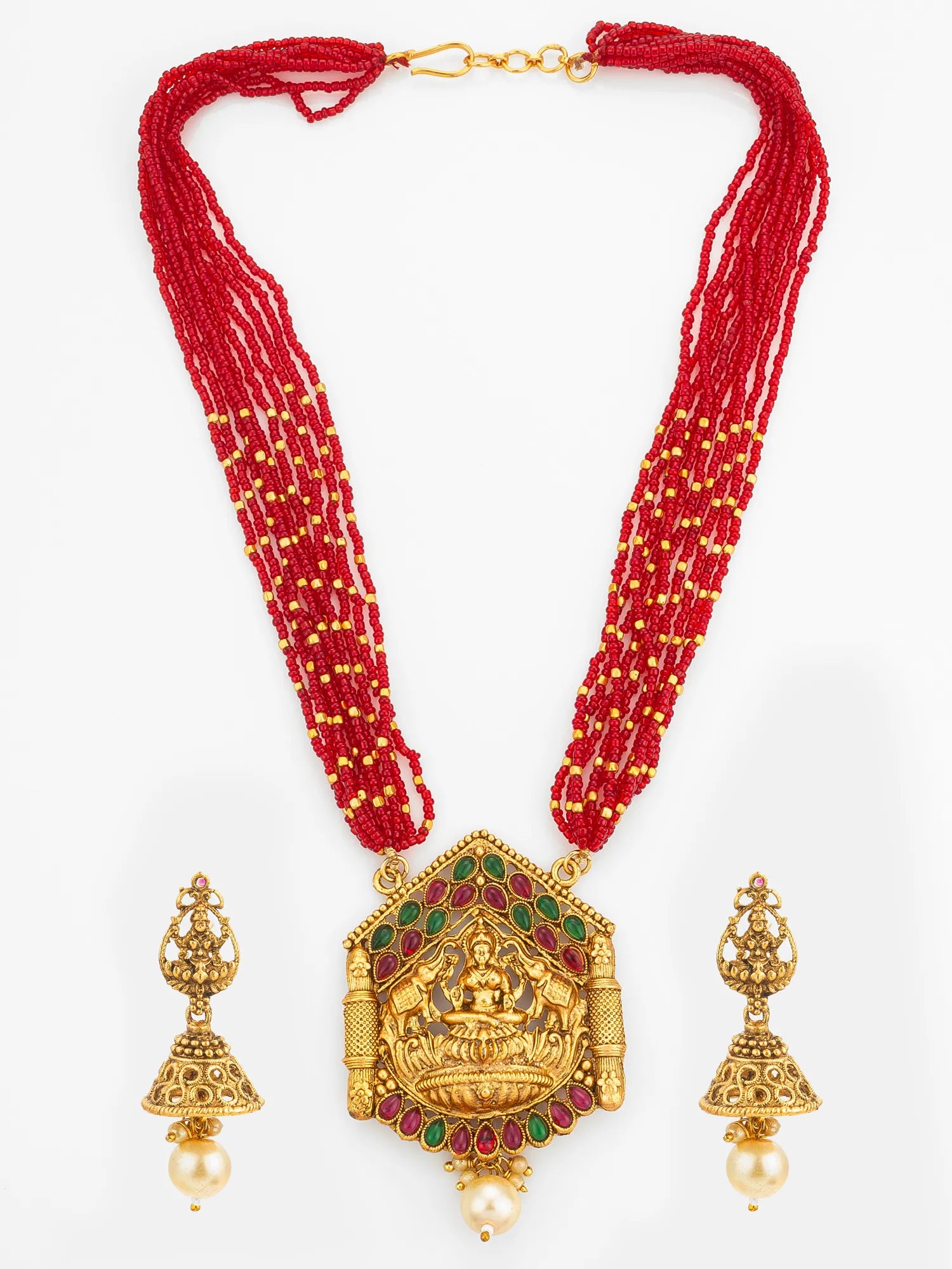 Red beaded necklace with gold pendant and earrings on a white background