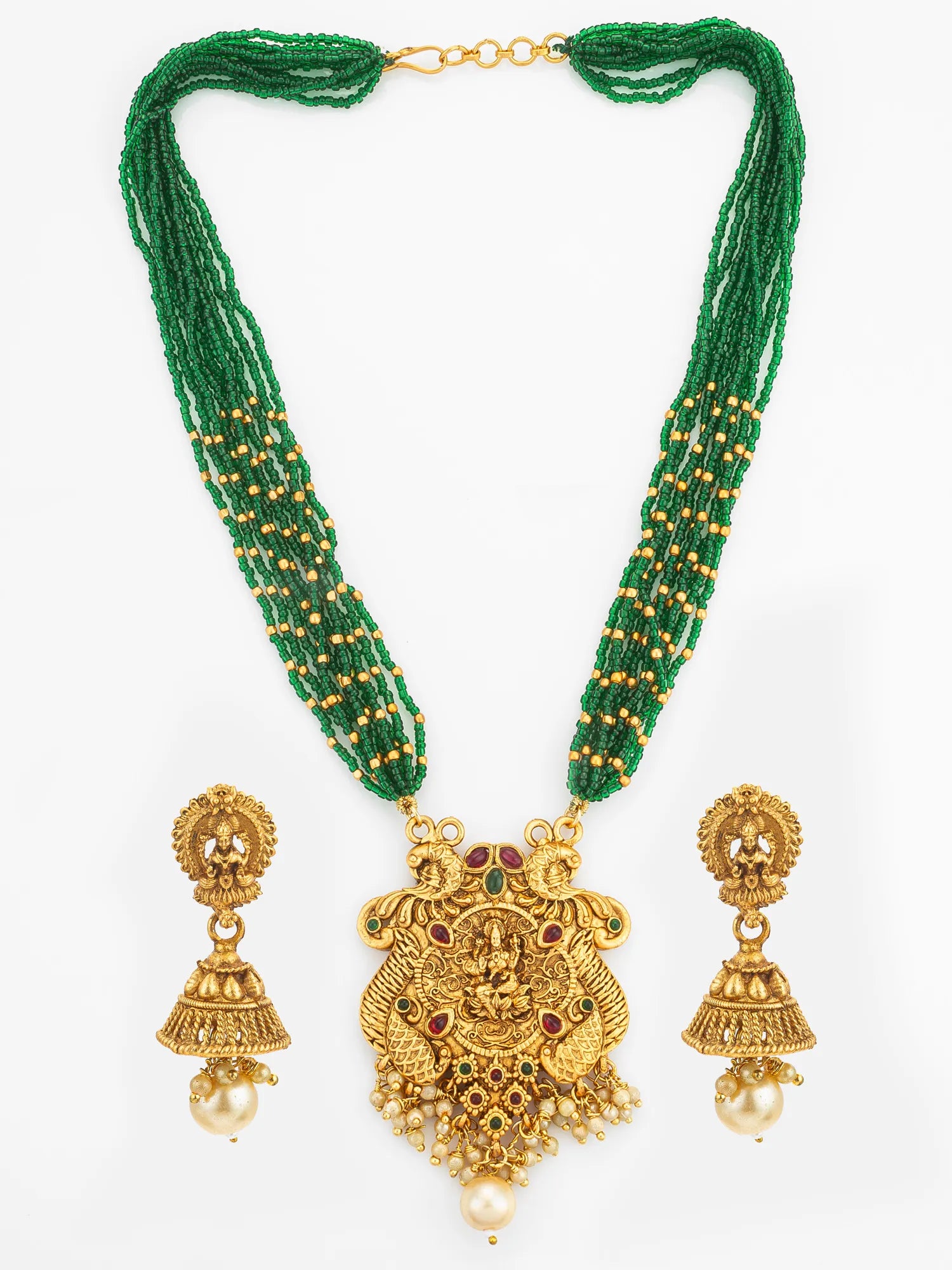 Gold necklace with green beads and matching earrings on a white background