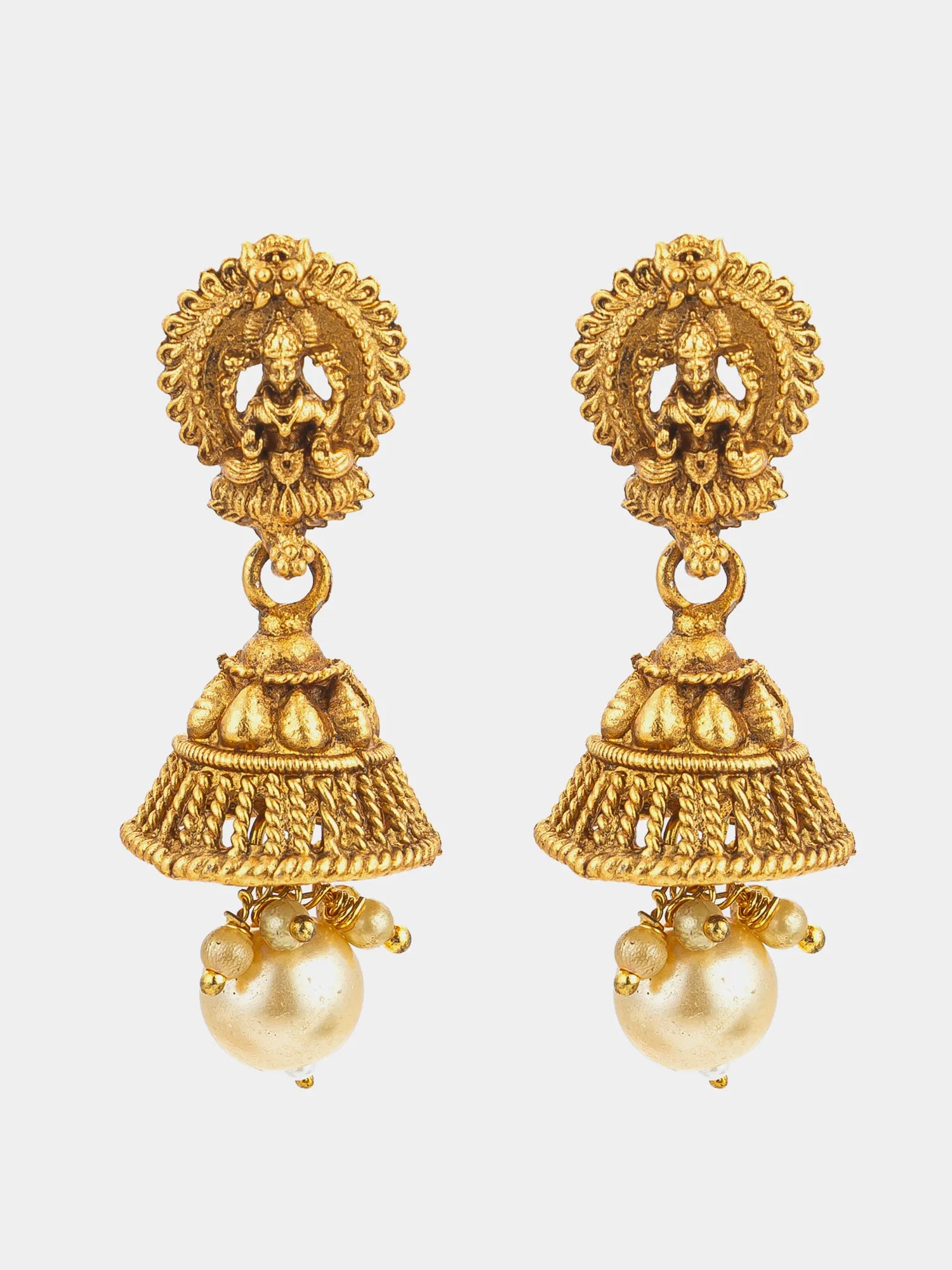 Gold earrings with intricate designs and pearl-like beads on a white background