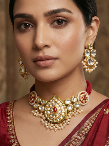 Aadita Gold Plated Kundan Paisley Motif Choker Necklace Set with Pearls