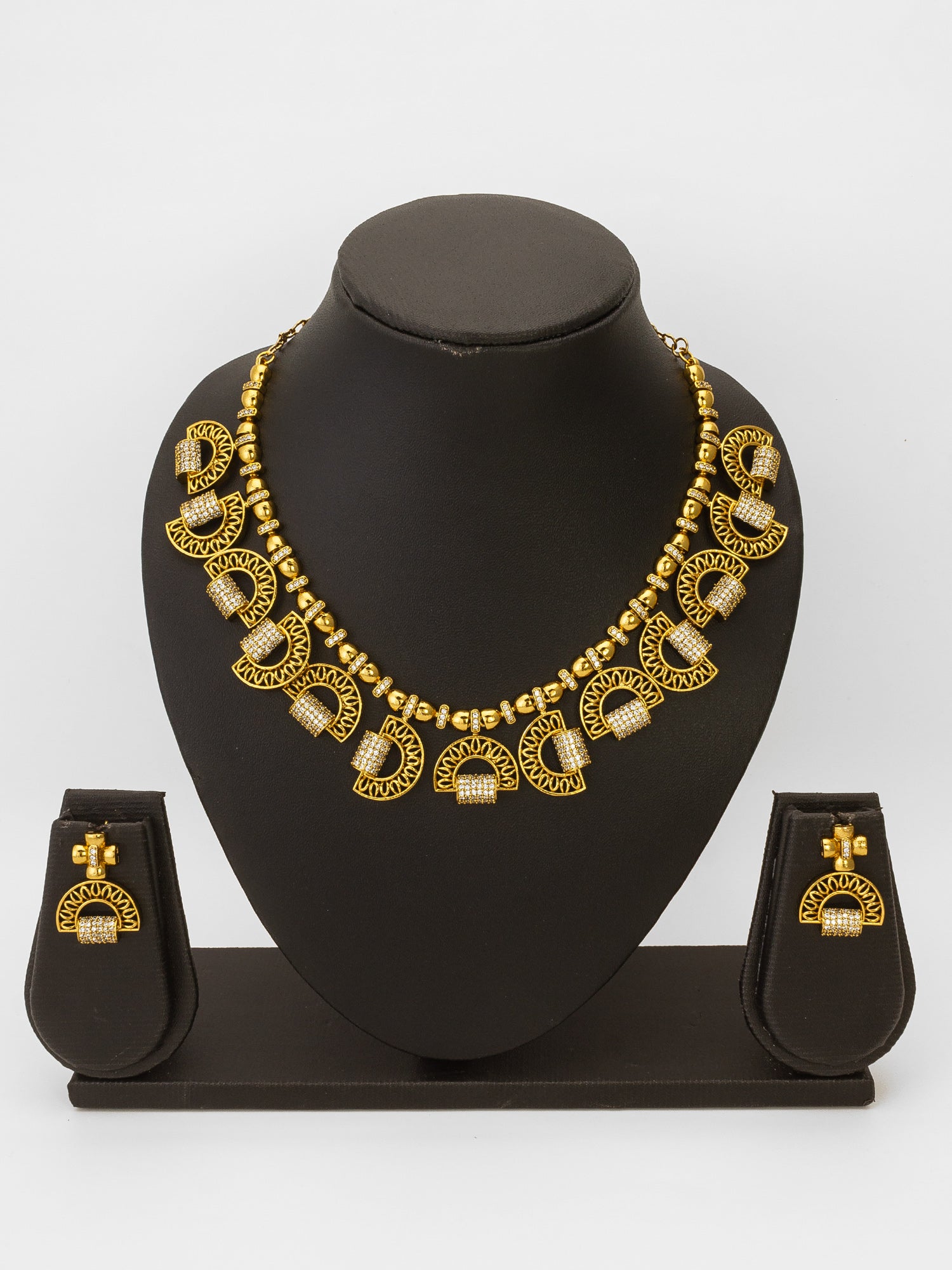 Aadita Gold-Plated AD Stone Half-Moon Arch Necklace Set with Geometric Stud Earrings