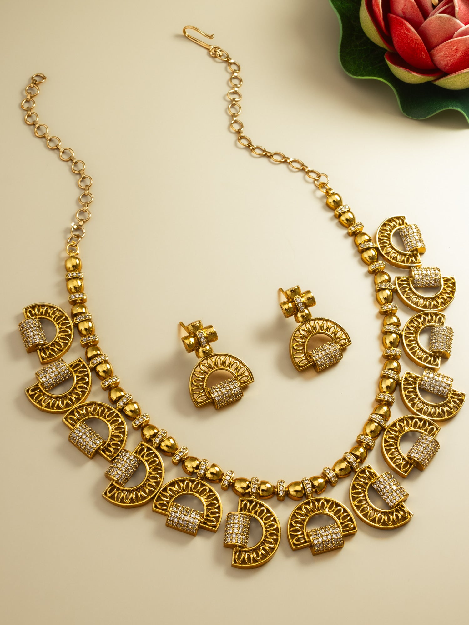 Aadita Gold-Plated AD Stone Half-Moon Arch Necklace Set with Geometric Stud Earrings