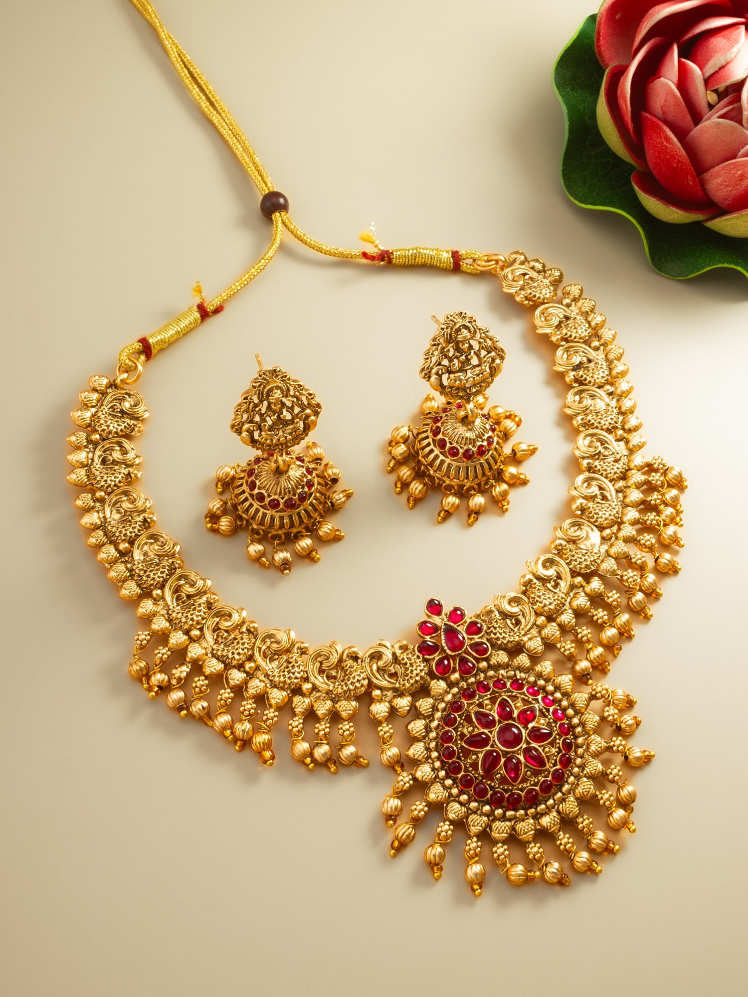 Aadita Antique Gold Temple Necklace Set with Stones and Jhumka Earrings