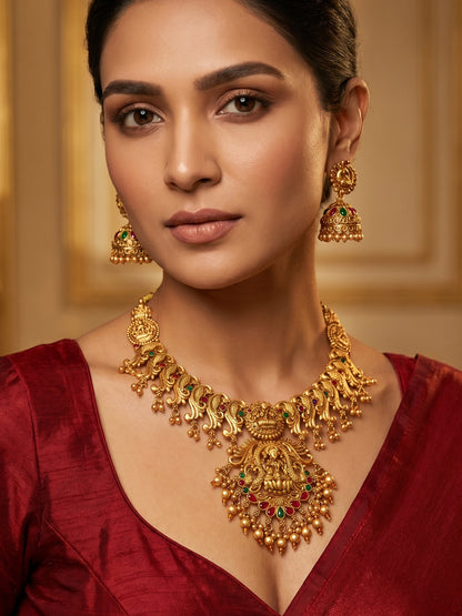 Aadita Antique Gold Temple Necklace Set with Lakshmi and Peacock Motifs, Stones and Jhumka Earrings