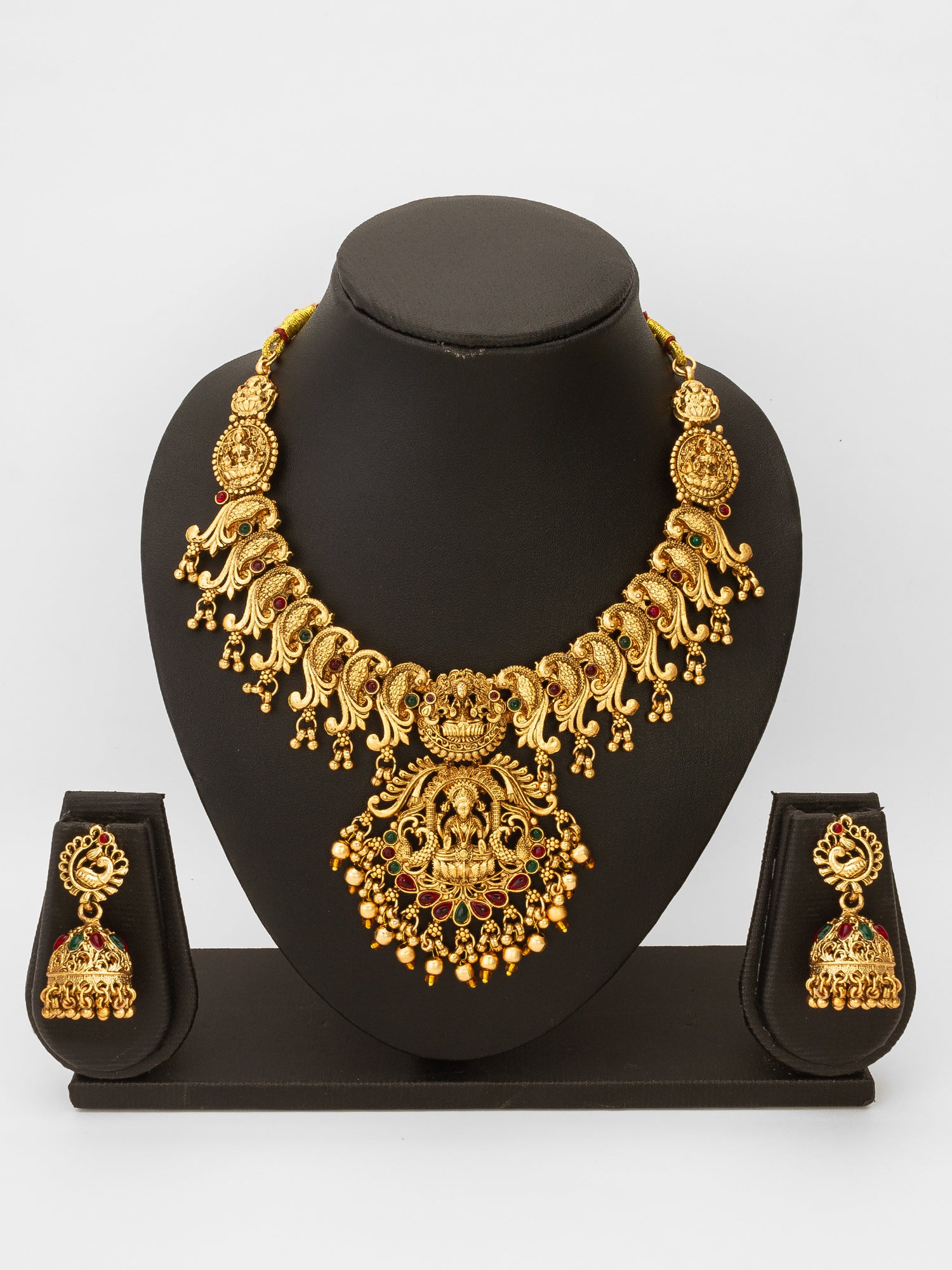 Aadita Antique Gold Temple Necklace Set with Lakshmi and Peacock Motifs, Stones and Jhumka Earrings