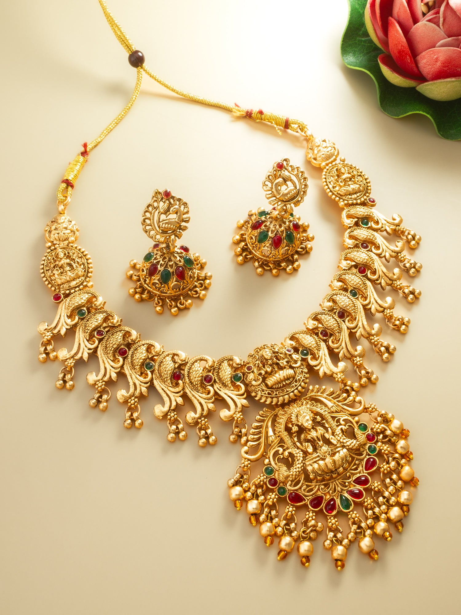 Aadita Antique Gold Temple Necklace Set with Lakshmi and Peacock Motifs, Stones and Jhumka Earrings