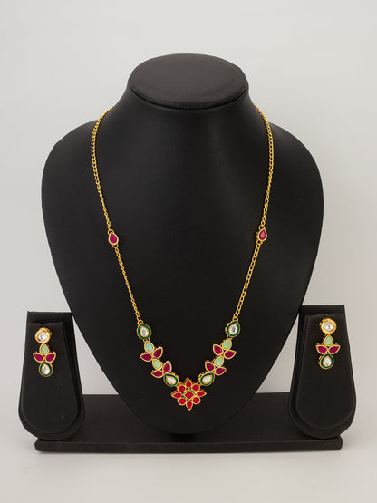 Aadita Gold Plated Teardrop Kundan Necklace with Red and Green Stones